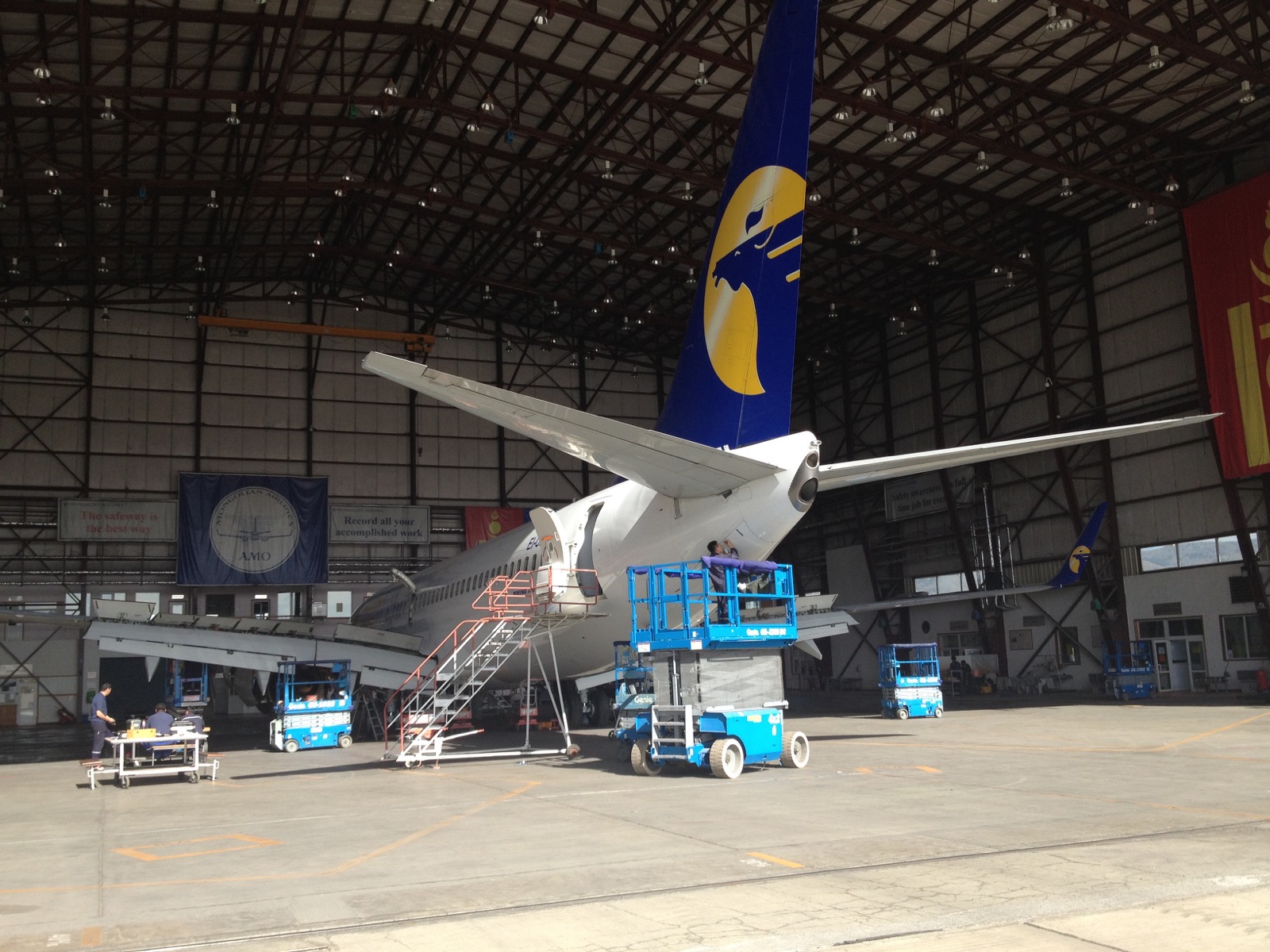 MIAT aircraft tail in a maintenance hangar