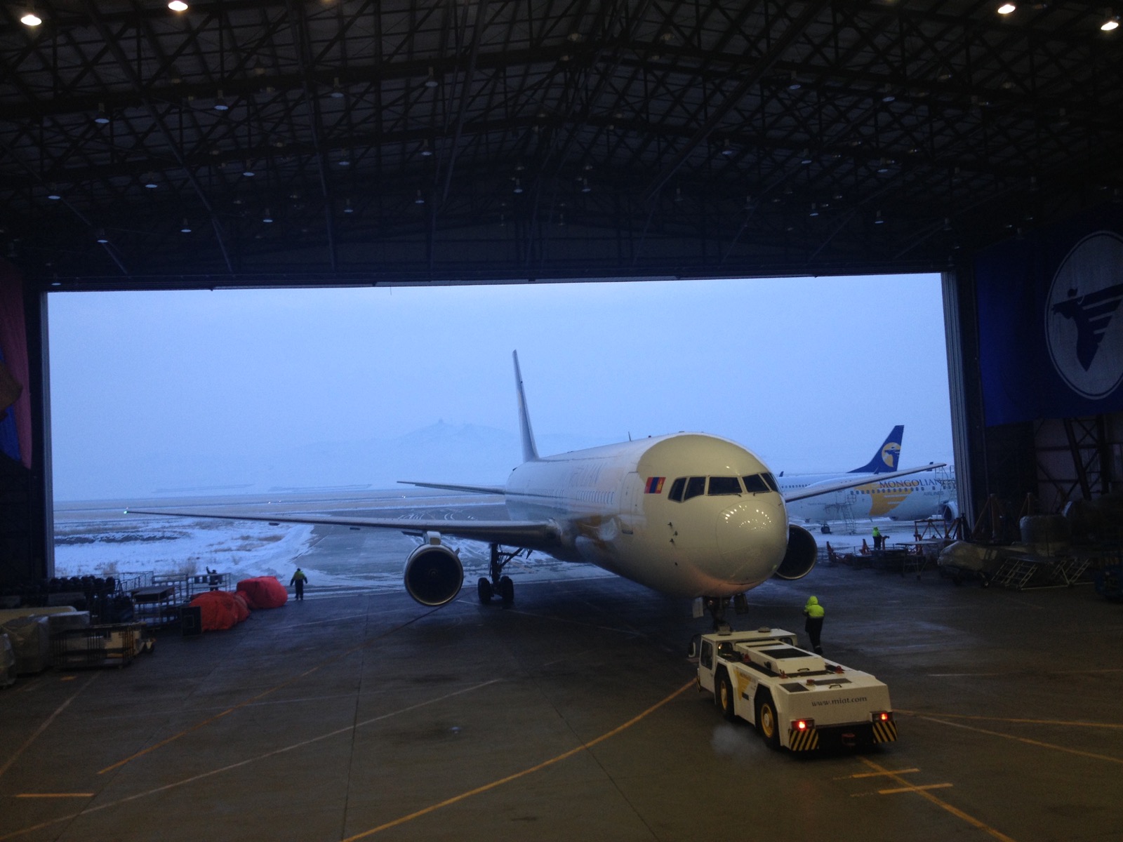 MIAT aircraft at a hangar entrance